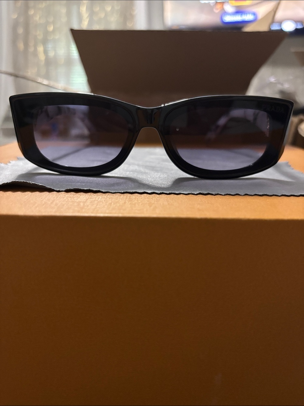 PRADA Black Cat-Eye Sunglasses with Gradient Lenses
